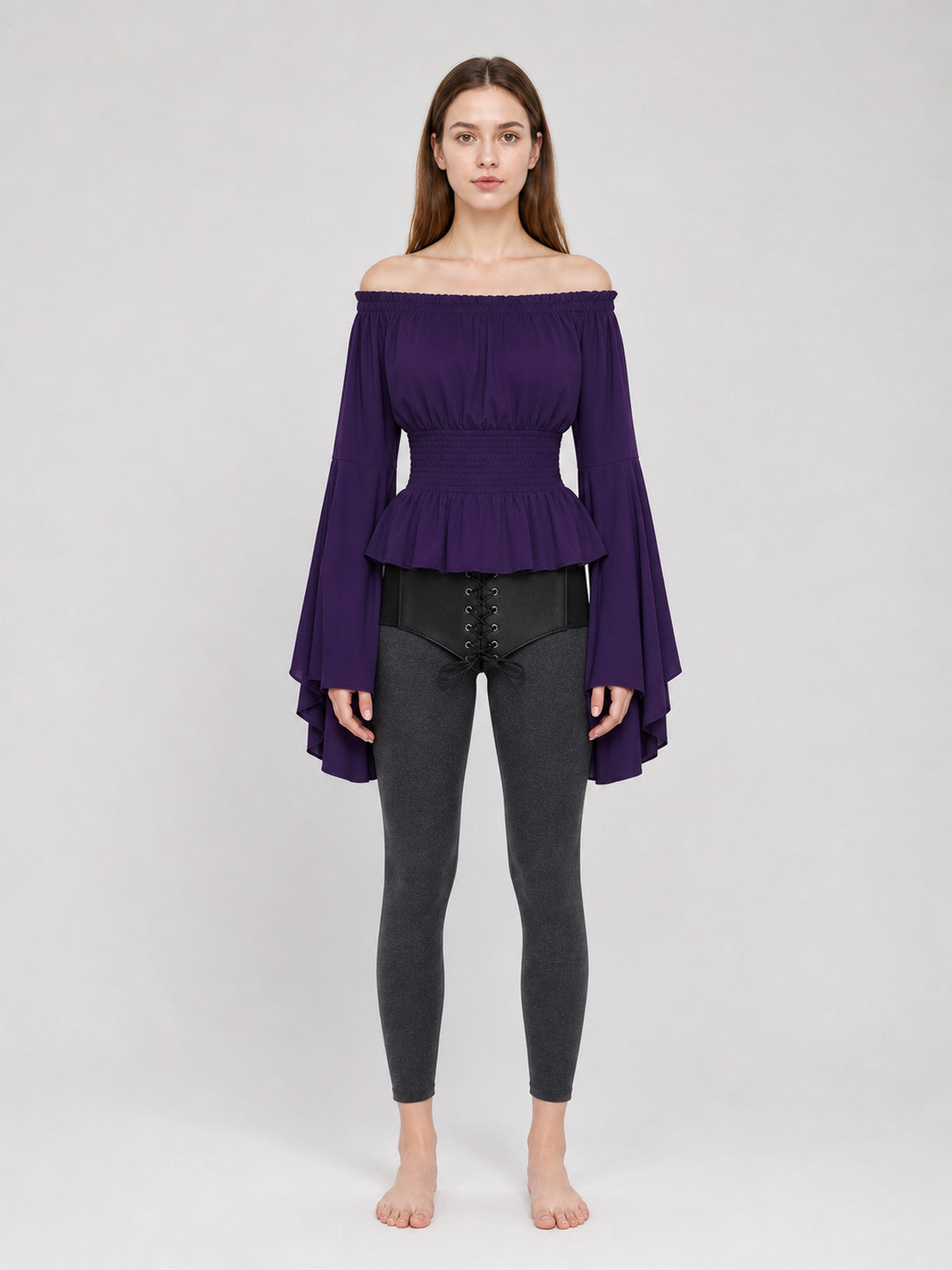 Purple blouse with a tie belt, off-the-shoulder neckline, and flared sleeves on-model view