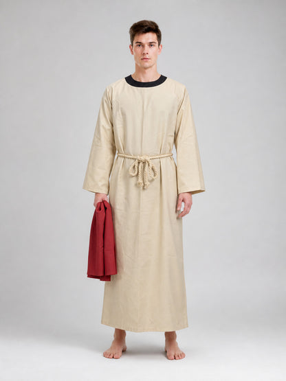 Full-body model wearing a cream long robe with black neckline, rope waist tie, and holding a red cloth