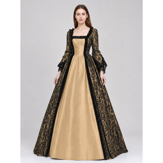 The dress is designed in a historical style with theatrical and decorative details. A golden-beige center is paired with black outer panels and damask-patterned trim, creating a striking contrast. The fitted bodice is decorated with visible