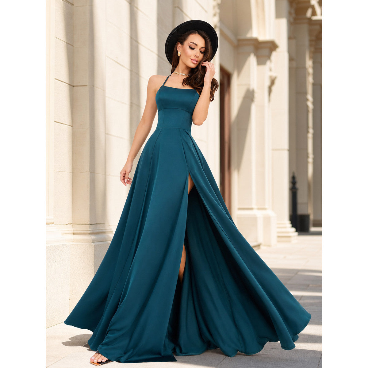 Women's floor-length dress with thin straps and a slit