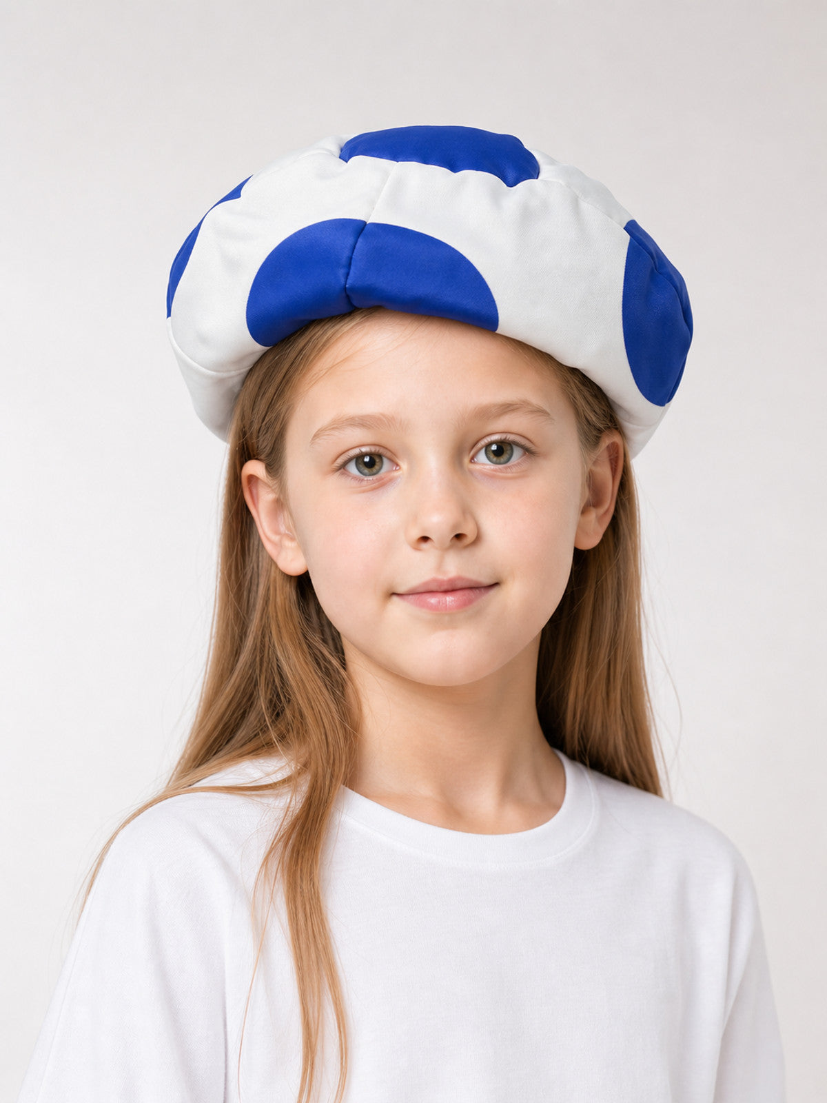 Round Blue and White Pillow with a Soccer Design