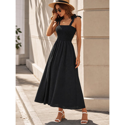 Women's black maxi dress with straps and a square neckline