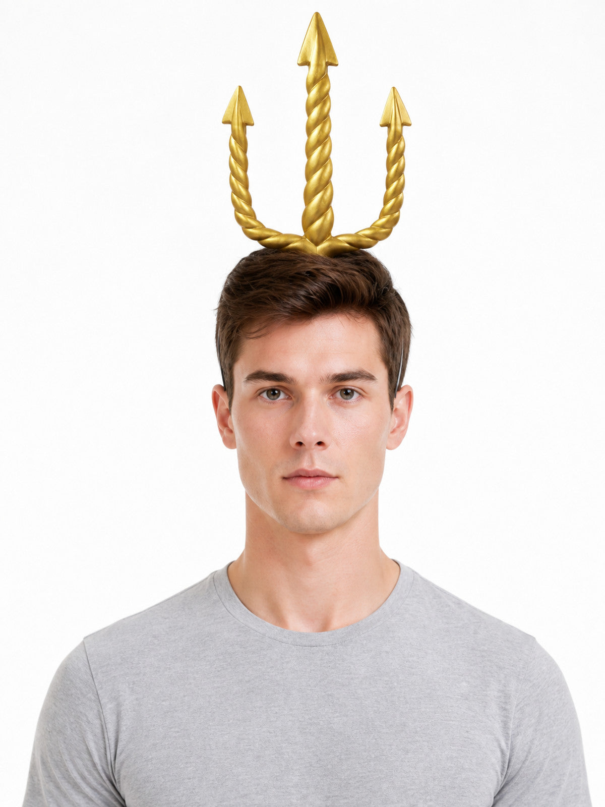 Golden three-pronged trident headpiece shown on a man's head in a close-up portrait