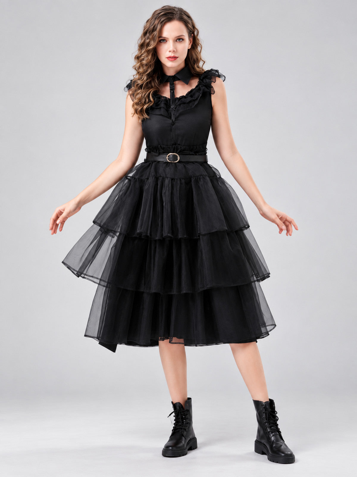 Black sleeveless dress with ruffles and a tiered skirt