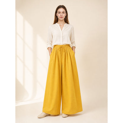 Mustard-colored wide-leg pants