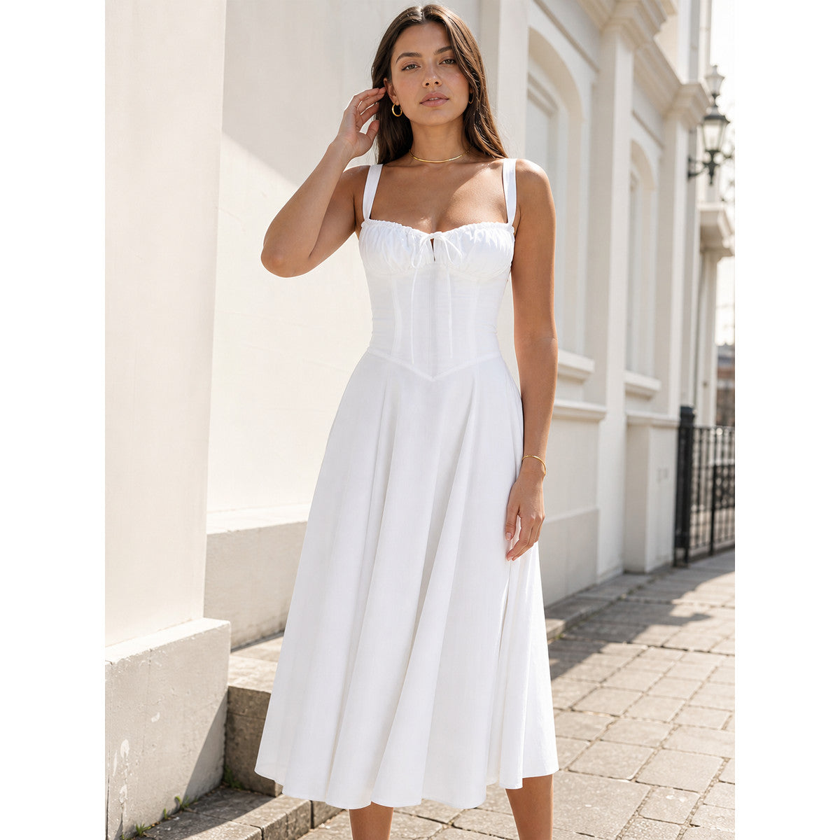 White Midi Dress with Thin Straps and a Fitted Bodice