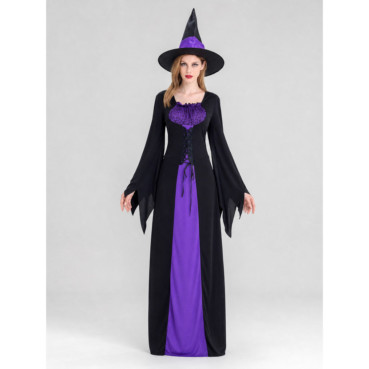 Cosplay costume designed as a long black and purple wizard-themed dress. The set includes a dress, a pointed wide-brimmed hat, and a collar. The design features long sleeves with flared cuffs, a fitted upper section, and a lace-up front. Th