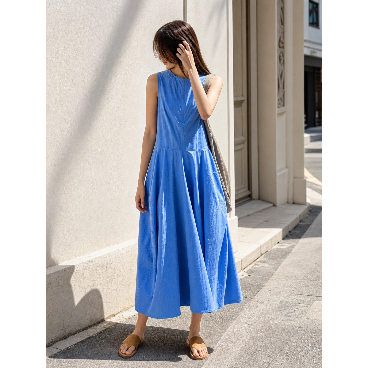 Women's blue sleeveless midi dress with pockets main product view