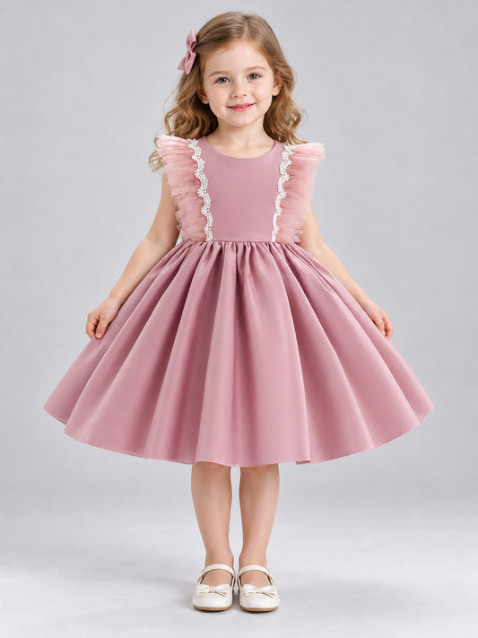 Dusty Pink Dress with a Full Skirt, Bow, and Ruffles