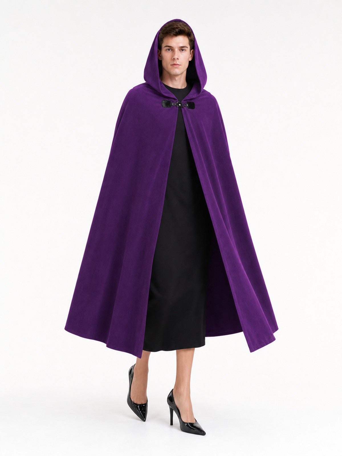 Purple hooded cape with black front clasp on a full-body model, worn over a black outfit against a white background