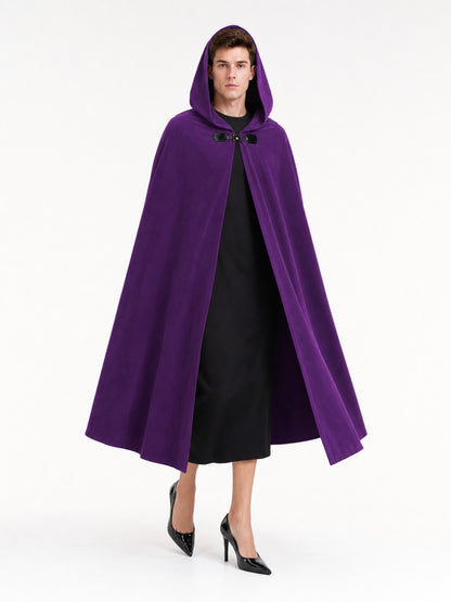 Purple hooded cape with black front clasp on a full-body model, worn over a black outfit against a white background