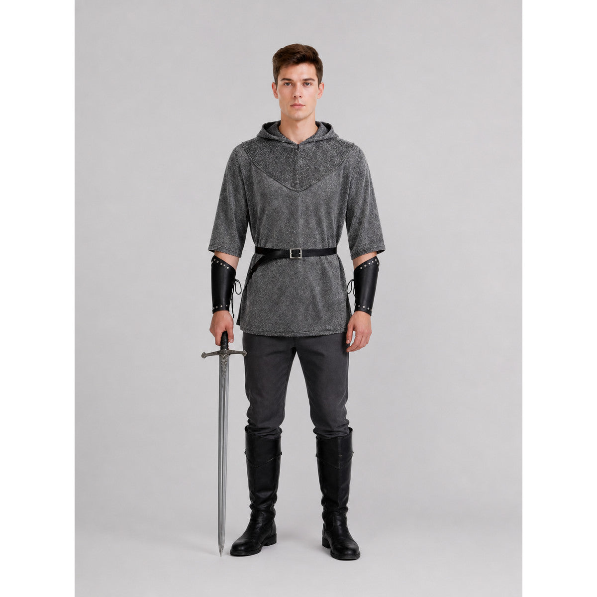 The costume is designed in the style of a medieval knight and is suitable for cosplay and stage performances. The set includes a gray hooded top with a layered front design, black pants, a belt, bracers, and greaves. The gray-and-black colo