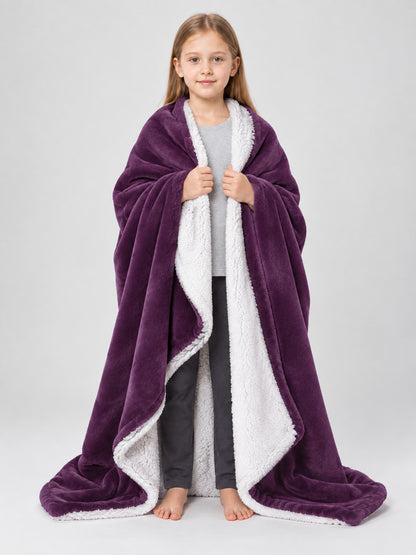 Reversible purple blanket with a white reverse side