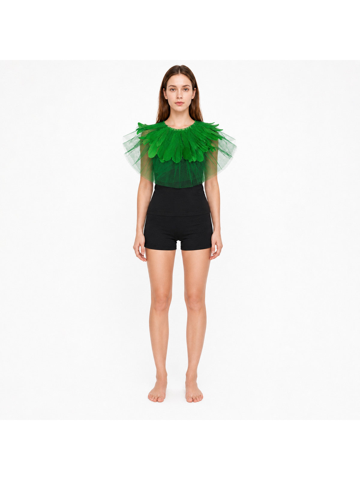 Green feather mesh shoulder cape shown on a full-body model against a white studio background, layered feathers across the shoulders