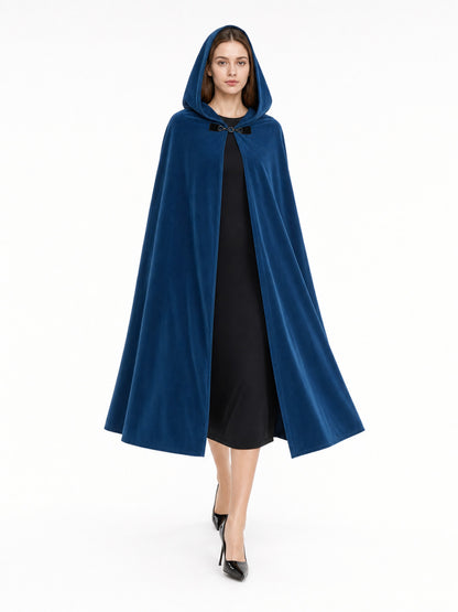 Blue hooded cloak with black bow clasp, shown full-body on a model over a black dress