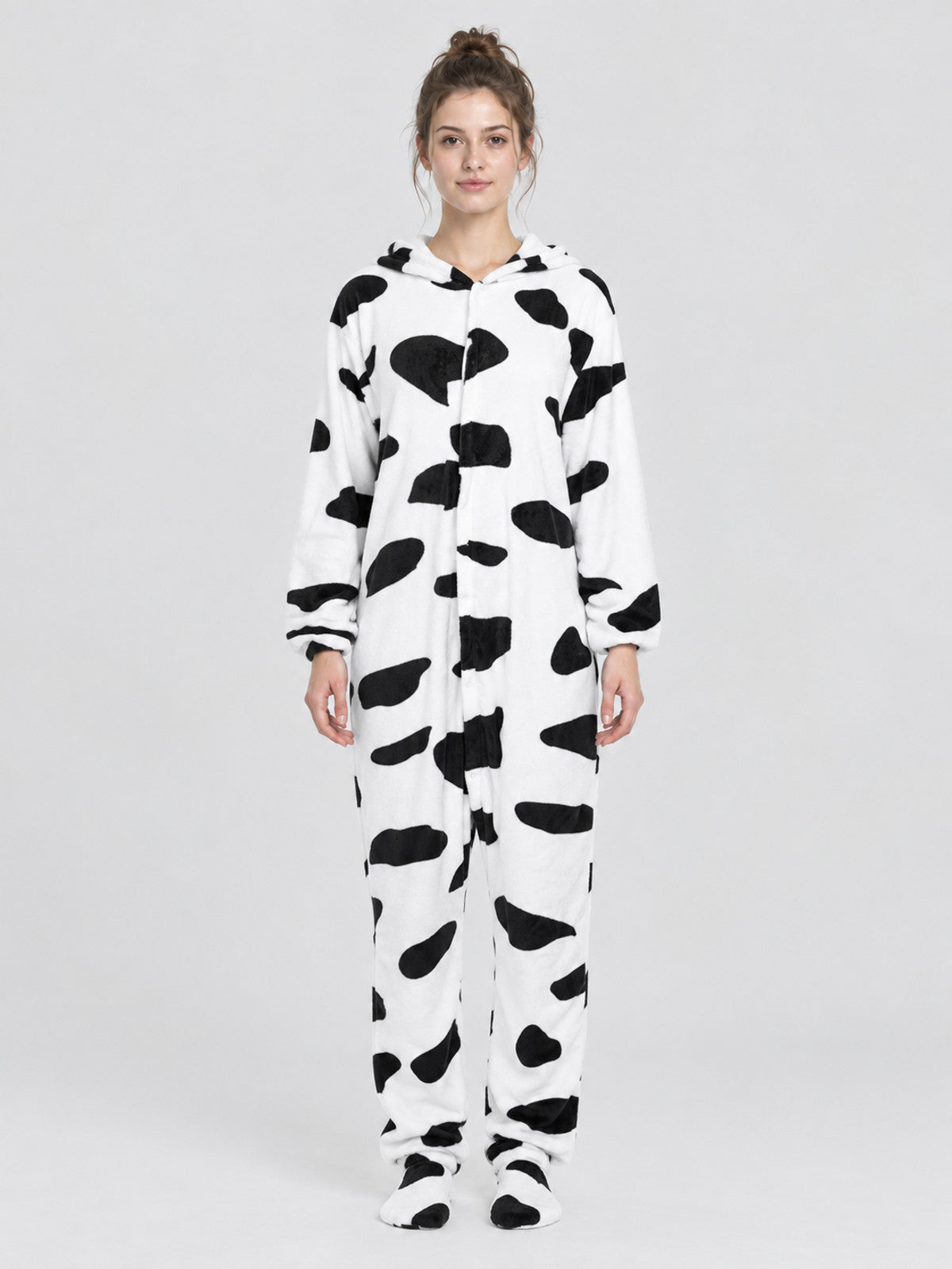 White pajama jumpsuit with black spots and a hood