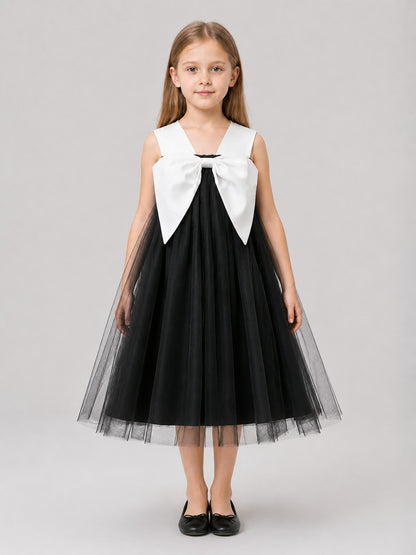 Children’s Costume Dress with a Voluminous White Bow on-model view