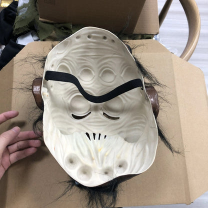 Inside of the spider half face mask showing the open back and black strap