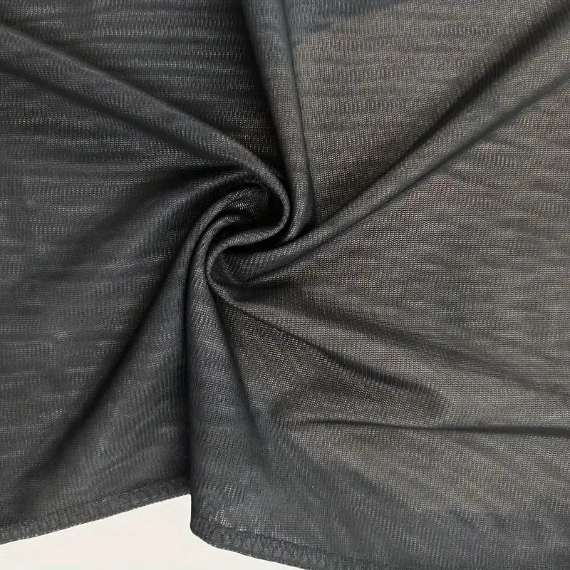 Close-up of the black stretch elastic mesh fabric