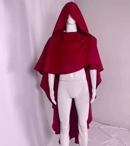 Real photo of the burgundy hooded cloak on a mannequin showing the open front and long back cape