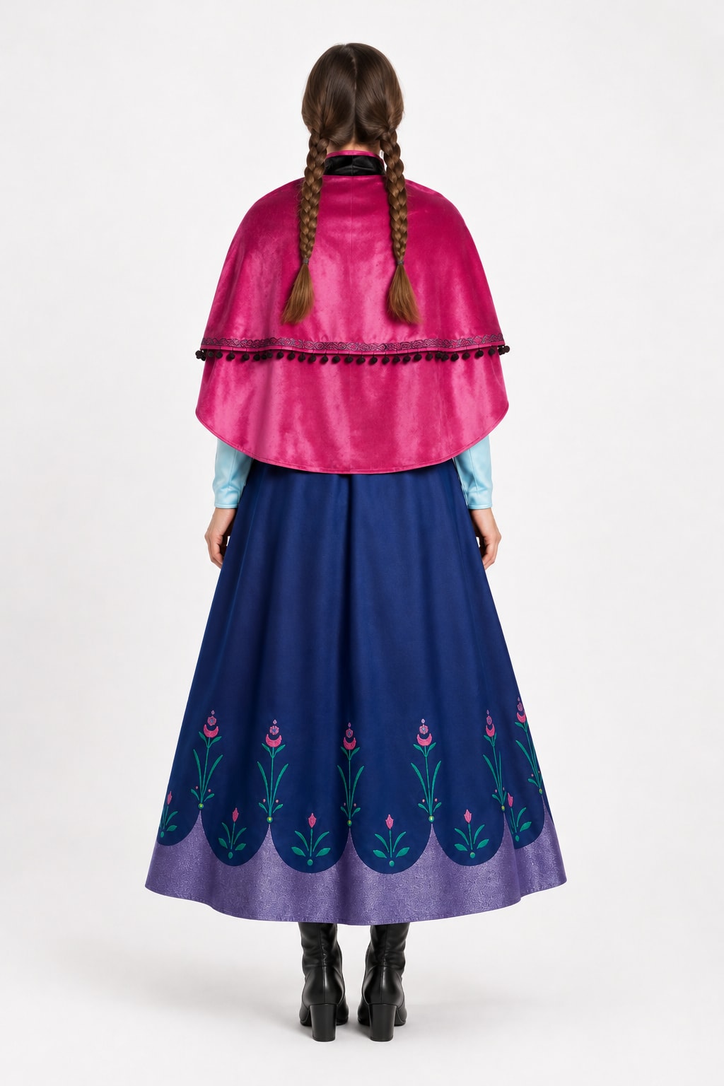 Back view of the princess costume: magenta velvet cape with black pom-pom trim over the royal blue embroidered skirt