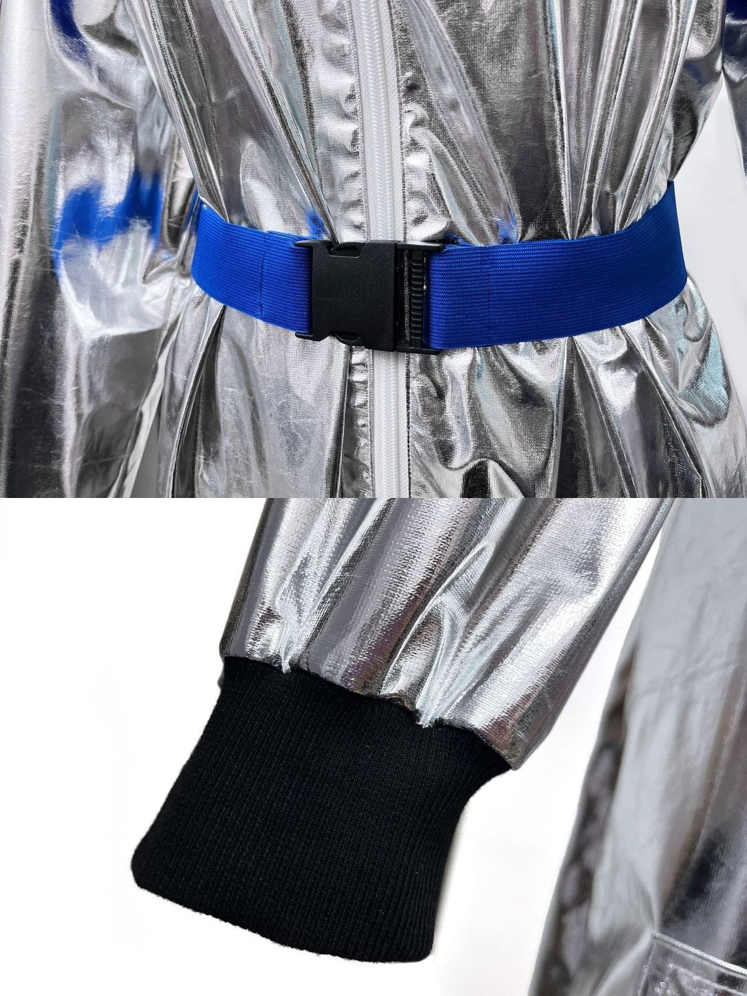 Close-up of the blue belt with black quick-release buckle and the black ribbed knit cuff on the silver metallic fabric