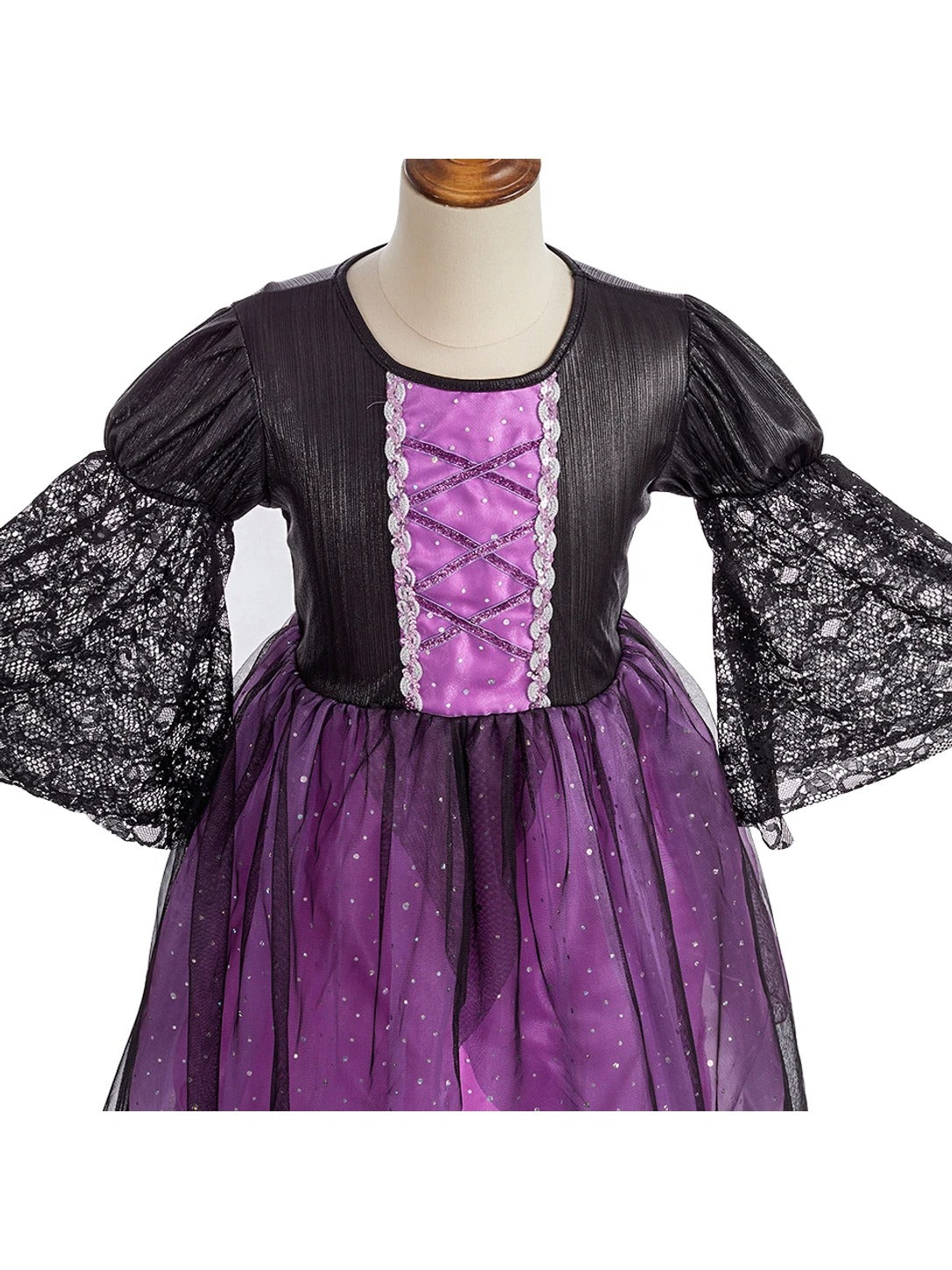 Close-up of the witch dress bodice: purple lace-up center panel, puffed shoulders and black lace bell sleeves