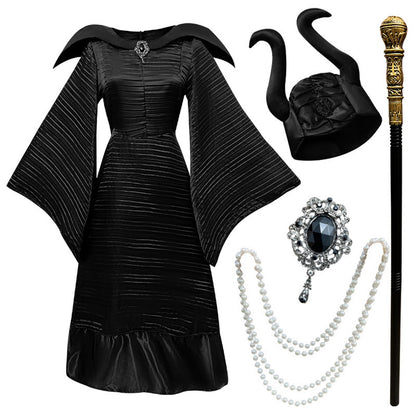What's included: black pleated witch dress, horned hat, gold-knob staff, layered faux pearl necklace and black-stone brooch
