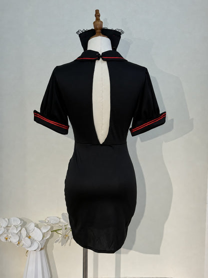 Back view of the black nurse cosplay dress showing the open keyhole back and red-striped cuffs