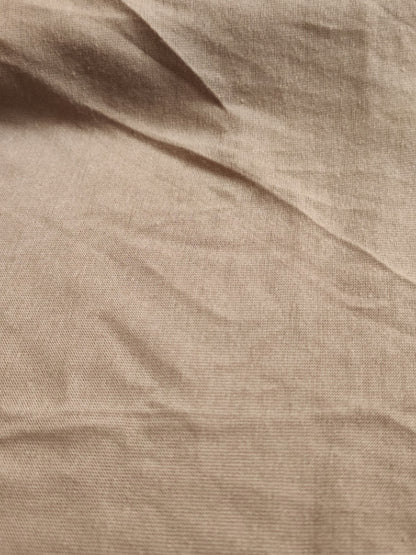 Close-up of the khaki knit fabric used for the short sleeve maxi dress