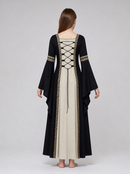 Medieval-style dress with flared sleeves, lacing, and decorative trim. The design is made in black with a cream-colored center panel and golden floral elements along the edges and on the cuffs. The open front layer frames the light-colored 