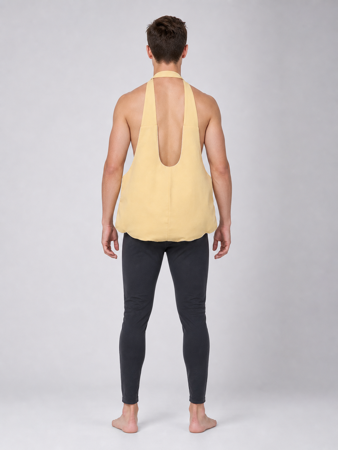 The fake belly is designed as a costume accessory with a large, rounded shape.