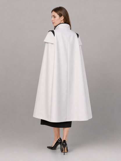 White carnival cape with black lapels