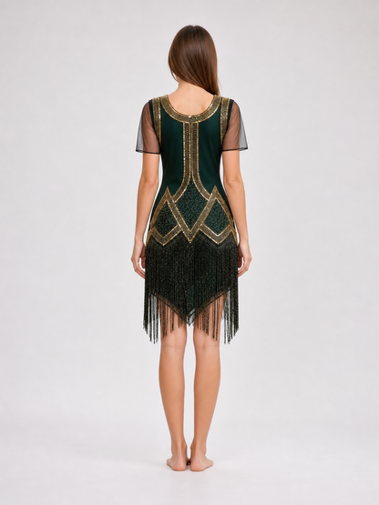 This fringed dress is designed in a vintage cocktail style, combining dark green