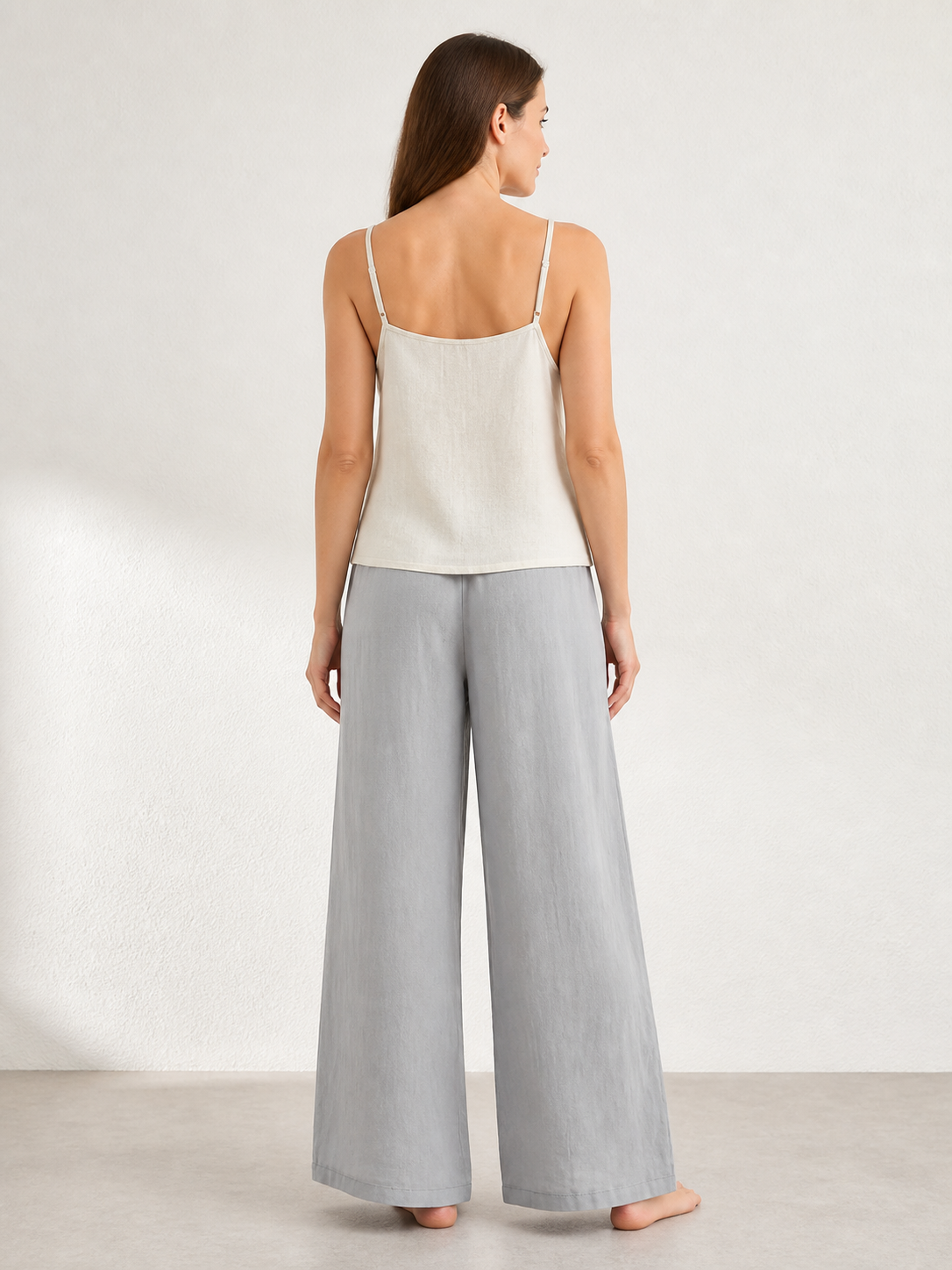 Gray wide-leg jeans with a drawstring and elastic waistband back view