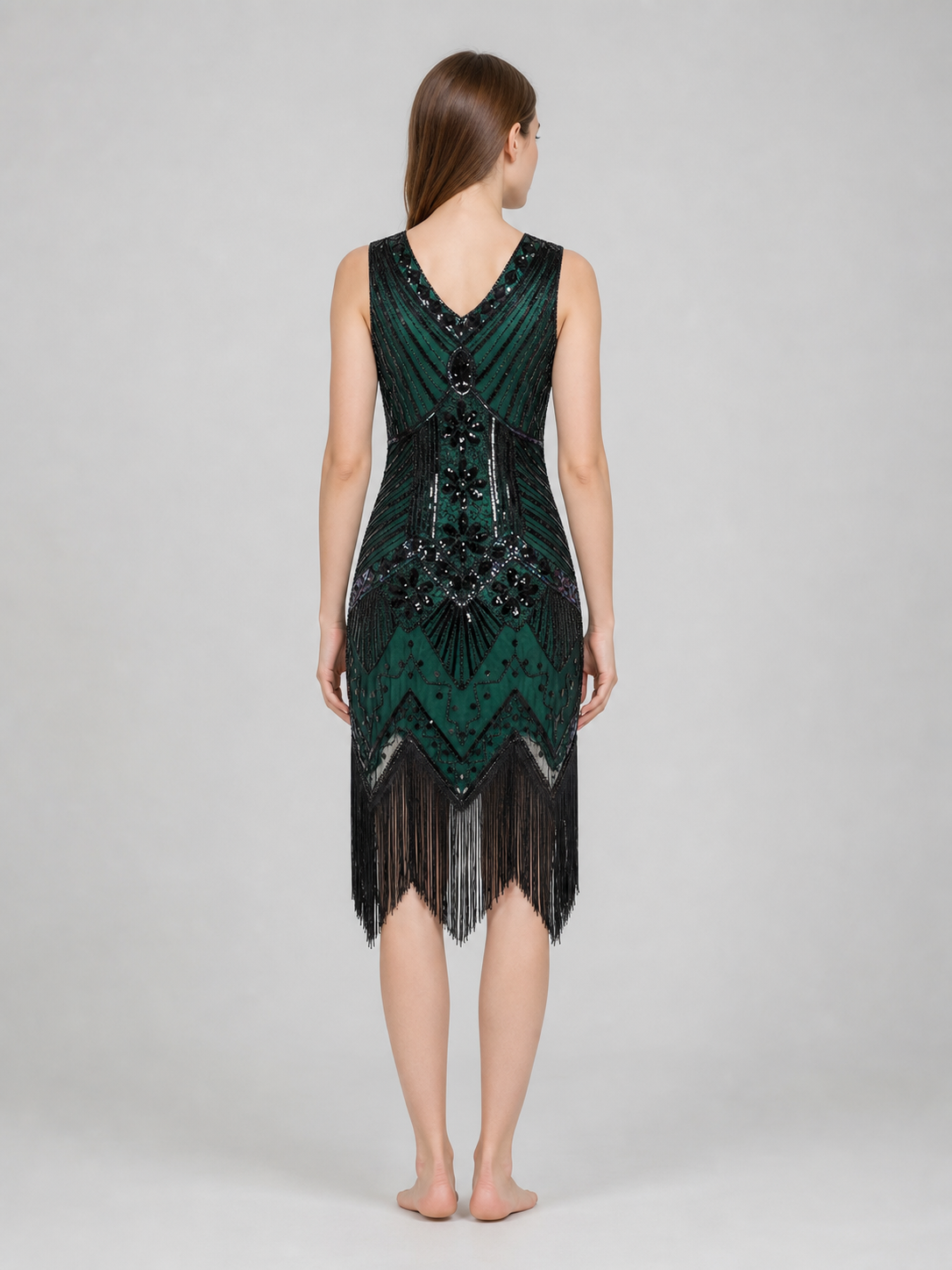 This flapper dress is designed in the Art Deco aesthetic and captures the