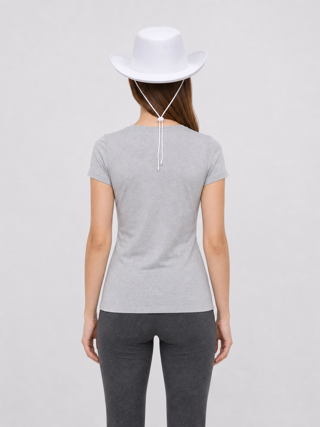 White Cowboy Hat with a Wide Brim and Chin Tie