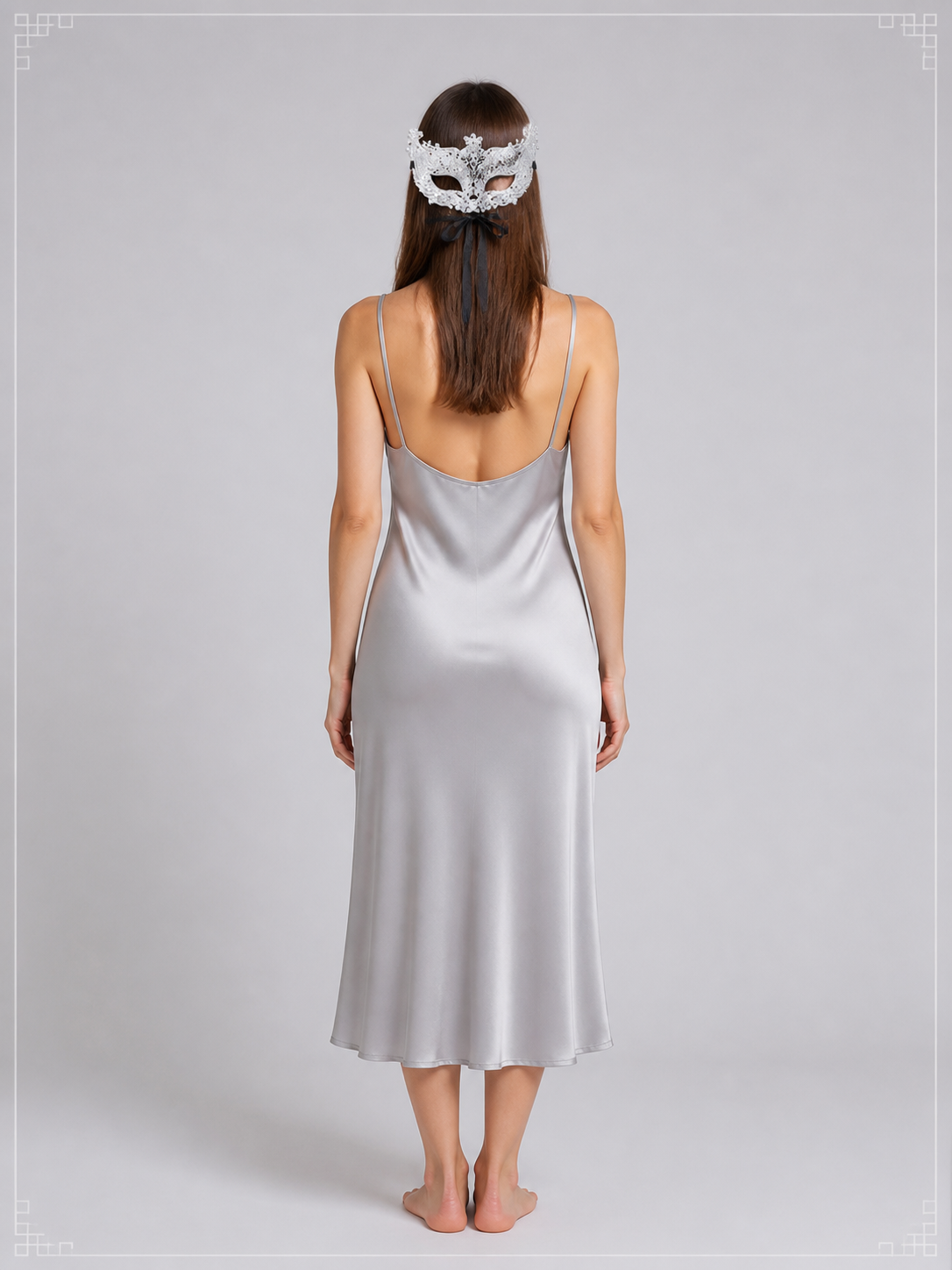 Openwork Silver Carnival Mask with Black Ties back view