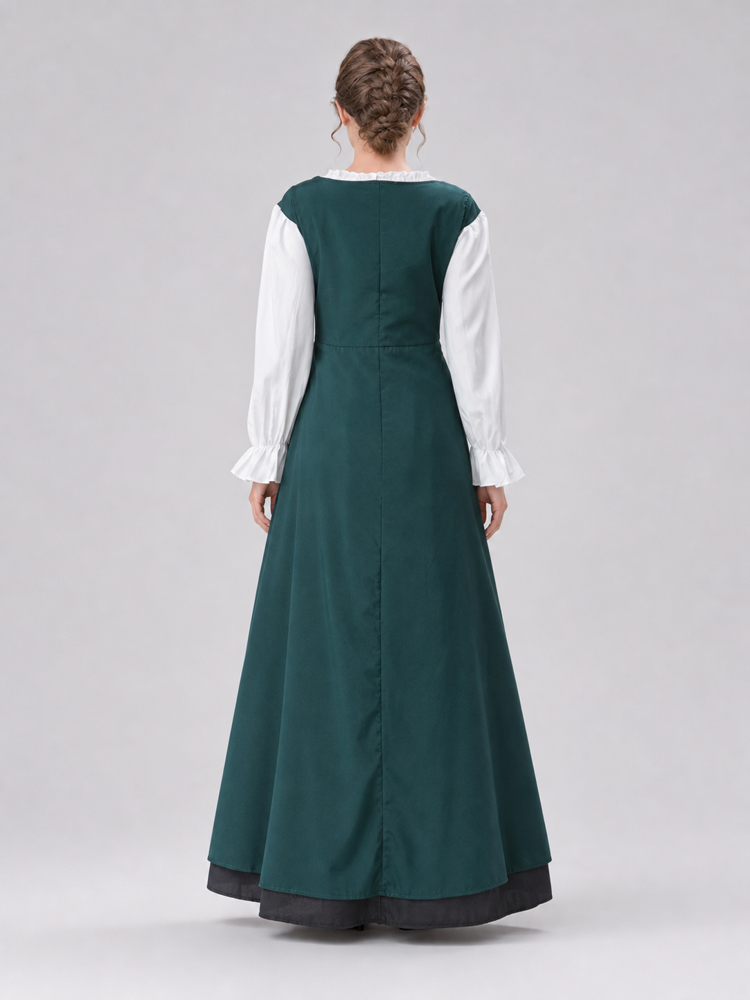 The retro dress is designed in a courtly style and comes with a woven headpiece. The dress is presented in deep green with long white sleeves, white trim along the edge of the collar and cuffs, and crisscross lacing at the front that emphas