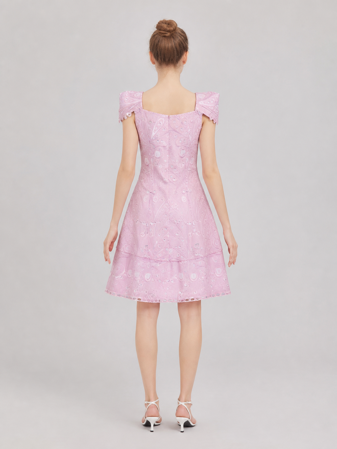 Pink cosplay dress inspired by the film “Wicked 2.” The design features a back view