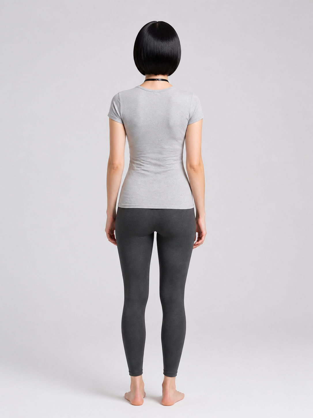 Short Black Carnival Wig with Side-Swept Bangs back view