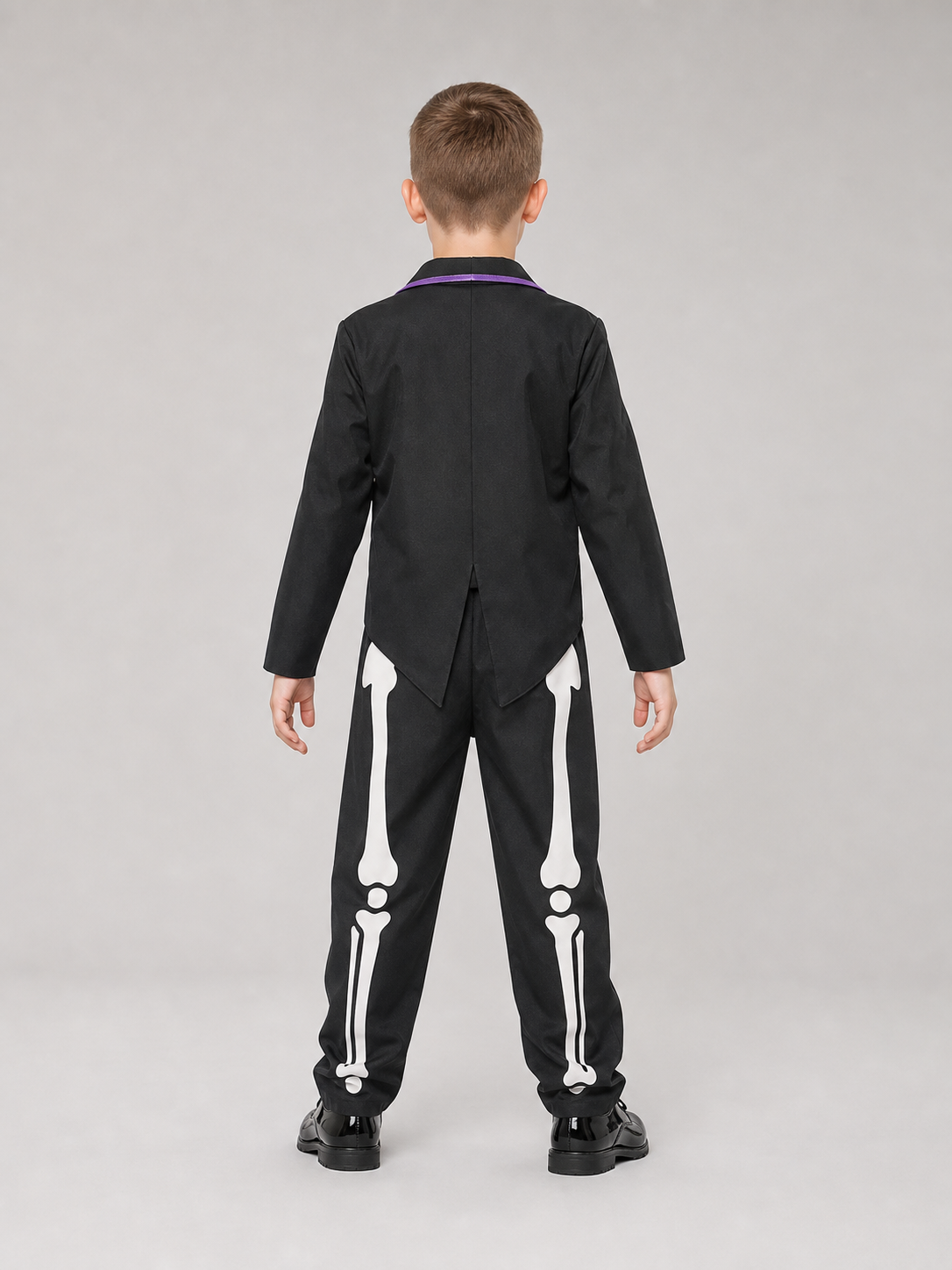 This skeleton costume is designed in the Mexican style of the Day of the Dead celebration. The outfit includes a black jacket with purple trim and floral decorations, a red vest-style front panel with decorative buttons, a red bow tie, blac