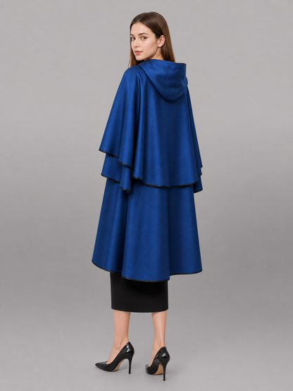 Blue hooded carnival cloak with black trim