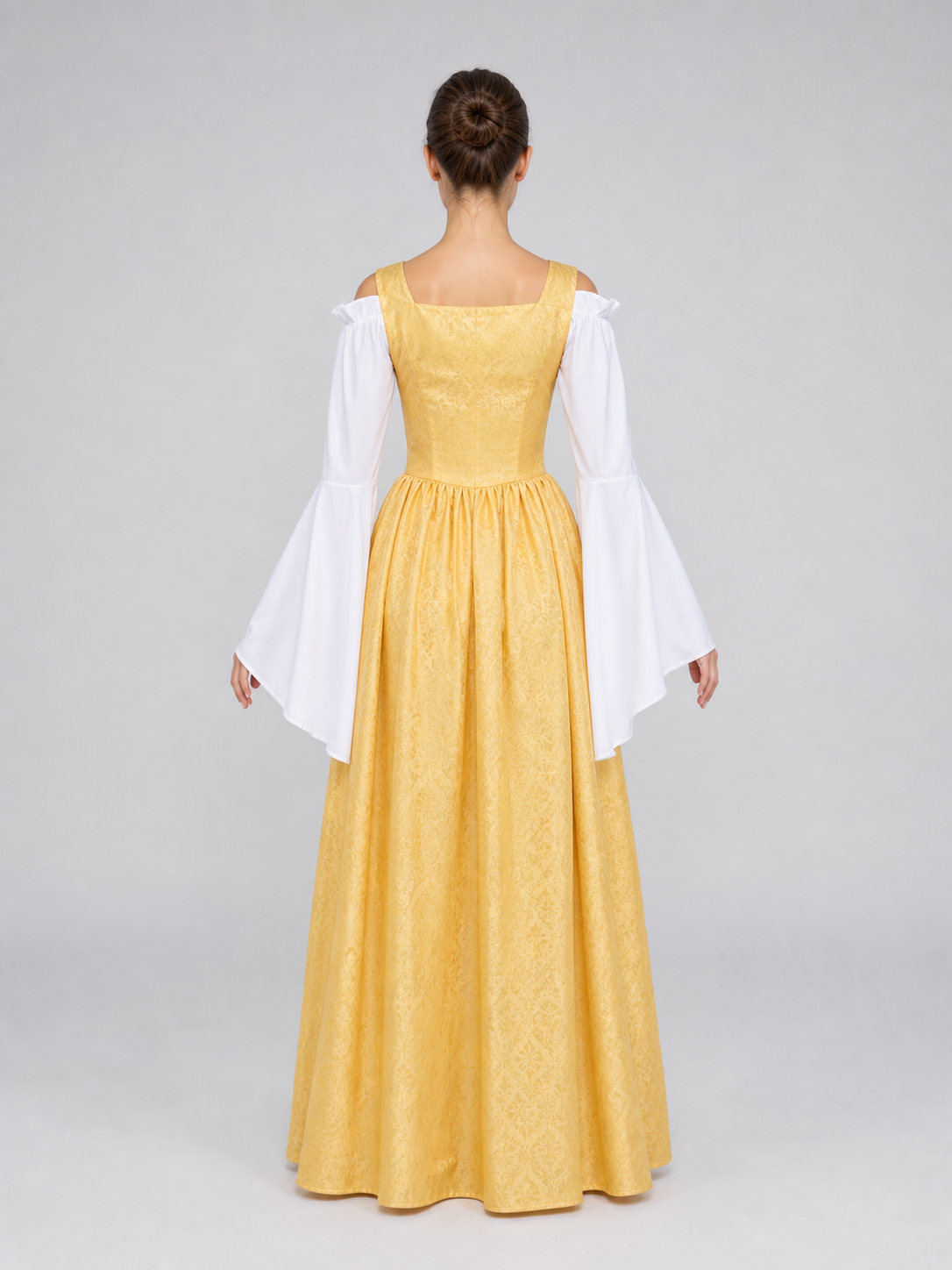 The yellow dress is designed in a fairytale costume style with distinctive
