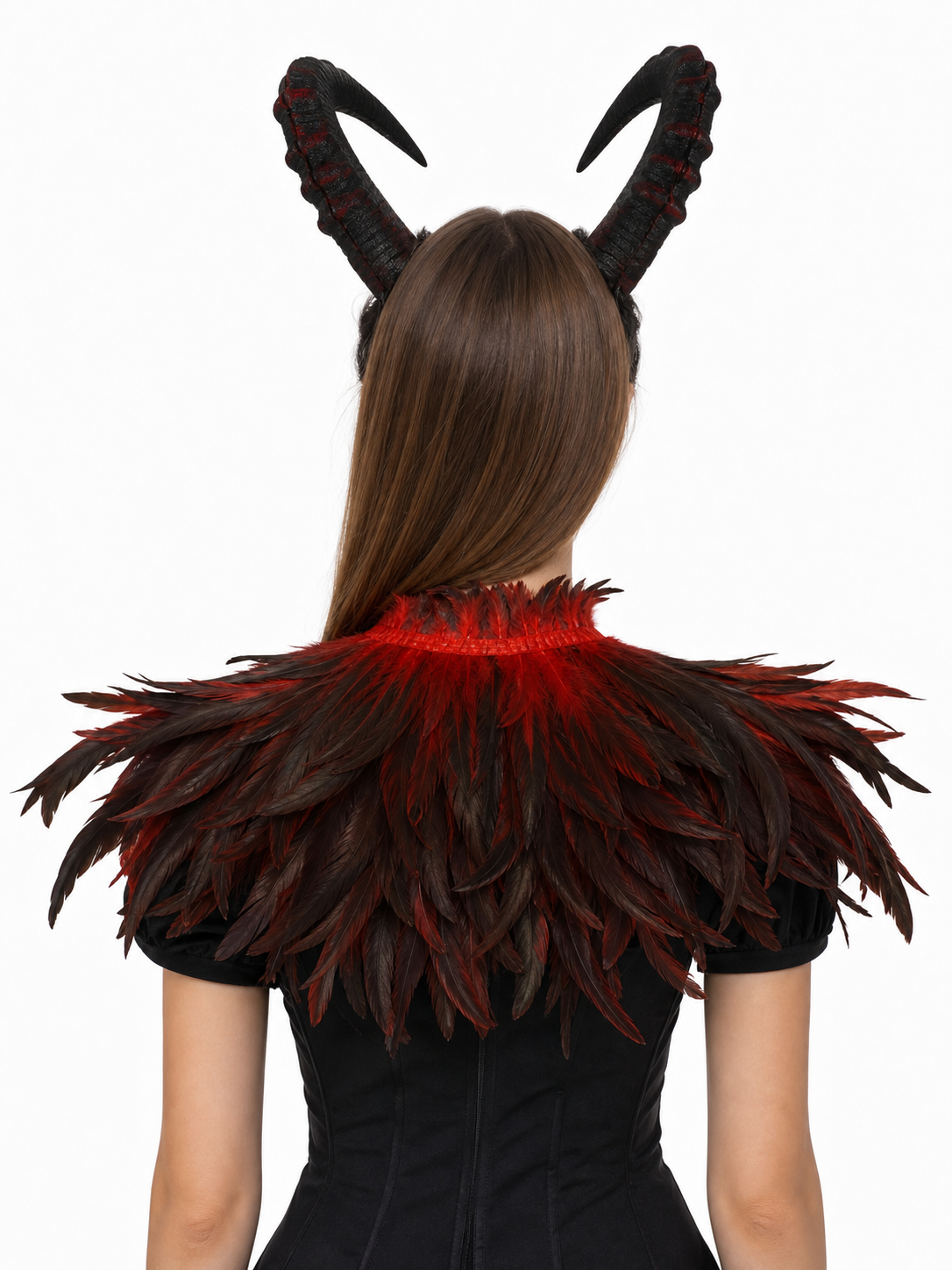 Back view of the black and red horned headpiece and layered feather collar worn over a black outfit