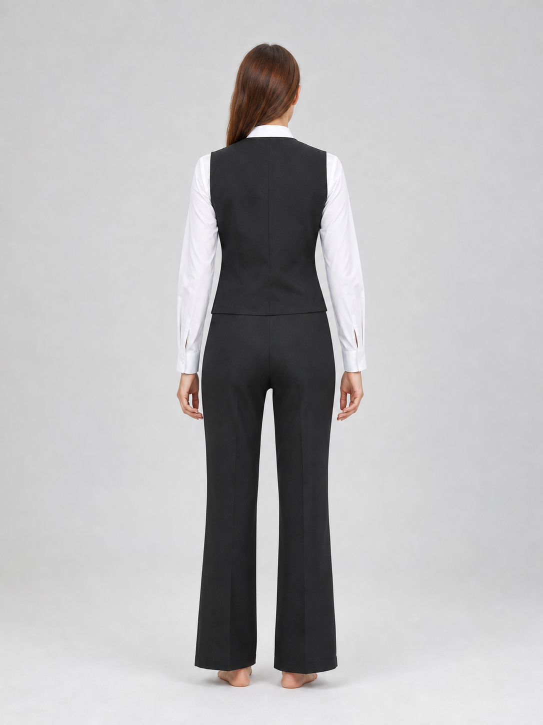 Vintage costume designed in a formal style with retro and gangster-inspired elements. The set includes a white long-sleeve shirt with a collar, a black button-front vest with lapels, a breast pocket, and lower pockets, as well as a black ne
