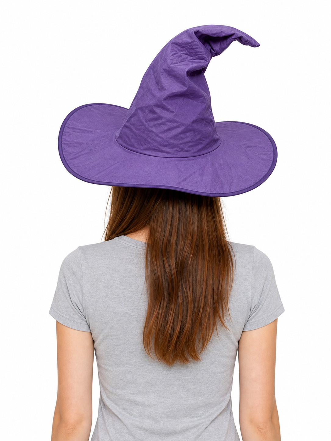 Back view of the purple pointed witch hat with a wide brim, worn by a model with long brown hair