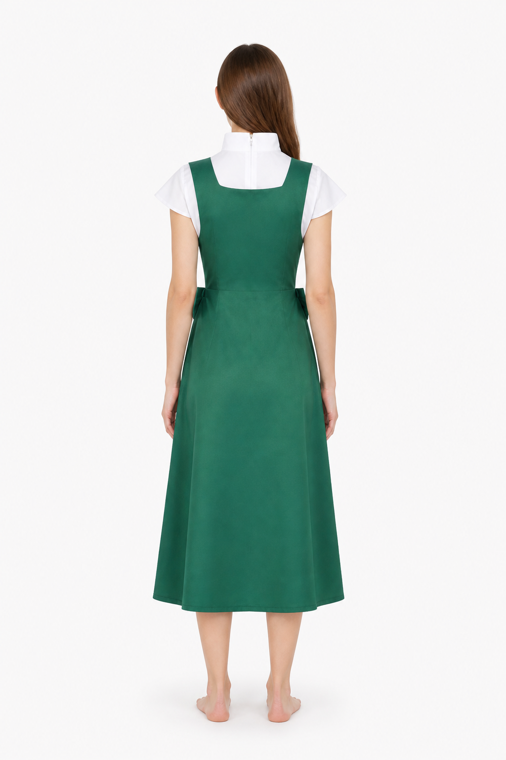 Long green pinafore dress with pockets back view