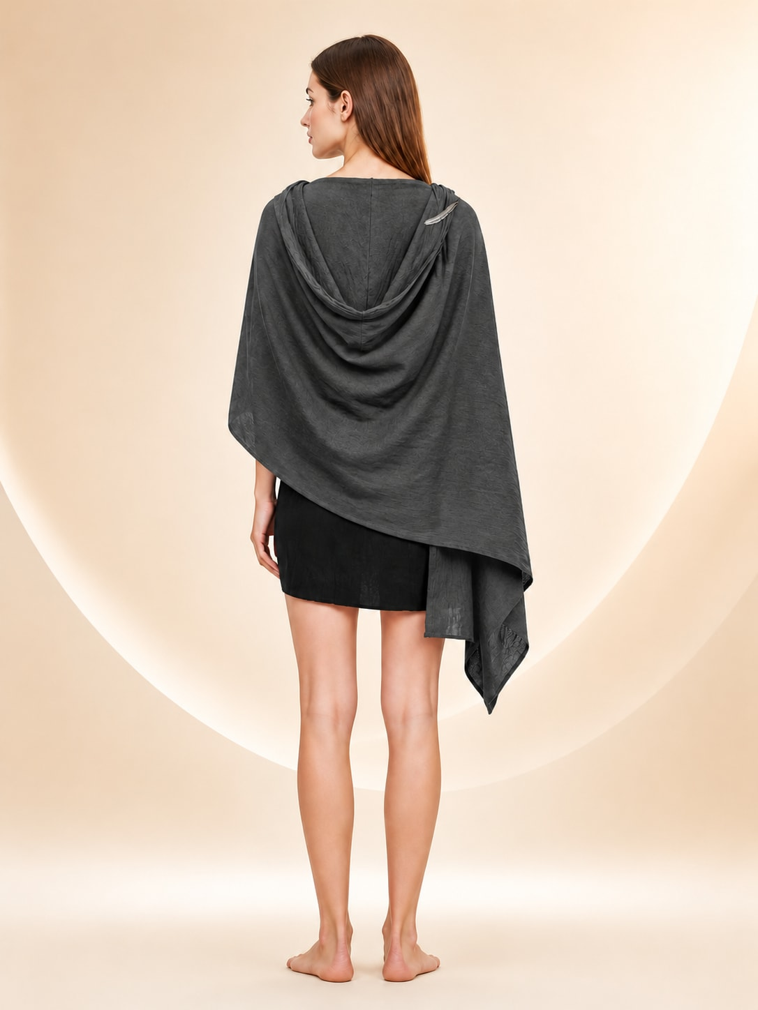 Back view of the gray hooded scarf wrap showing the hood and asymmetrical pointed hem