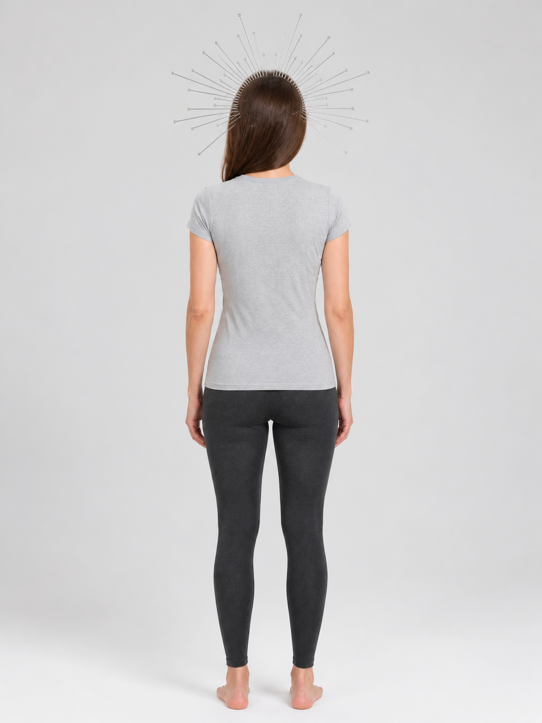 Silver halo headpiece with bead-tipped wires shown from the back on a full-body model